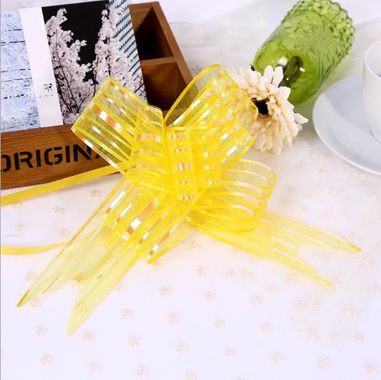 yellow gift wrap ribbon pull bow